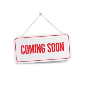 Coming soon sign hanging isolated on white wall